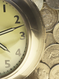 Silver Clock on Top of Pile of Silver American Coins