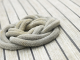 Knot of Rope on Wooden Boat Deck