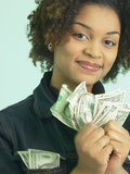 Buy Woman Holding Money at AllPosters.com