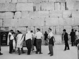 Jewish Men in Various Modes of Traditional Dress at the Wailing Wall in Jerusalem