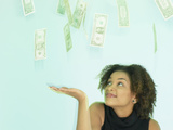 Buy Woman Looking at Money at AllPosters.com