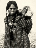 Woman from an American Indian Tribe with a Baby Resting in a Basket on Her Back