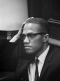 Malcolm X waits at Martin Luther King Press Conference, 1964