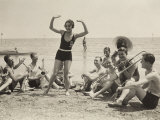 Buy A Young Woman, Surrounded by Musicians, Dances on a Beach of the Lido of Venice at AllPosters.com