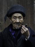 Buy An Old Man Smoking Pipe, China at AllPosters.com
