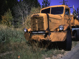 Buy An Orange Truck at a Car Cemetery in Colorado at AllPosters.com