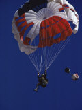 Skydiver with Red, White and Blue Parachute