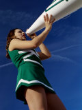 Low Angle View of a Cheerleader Holding a Bullhorn