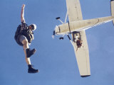 Skydivers Jumping from Plane