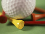 Close-up of a Golf Ball and Tees