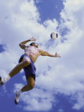 Buy Mid Adult Man Playing Beach Volleyball at AllPosters.com