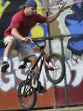Buy Airborne Bicyclist at AllPosters.com