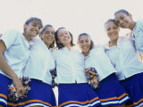 Low Angle View of a Group of Cheerleaders Smiling