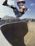 Rollerblader Perfoming Trick on Ramp