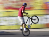 Buy Bicyclist Riding on Rear Wheel at AllPosters.com