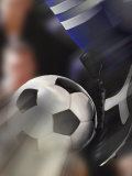 Buy Close-up of a Soccer Player Kicking a Soccer Ball at AllPosters.com