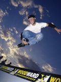 Rollerblader Perfoming Trick on Ramp