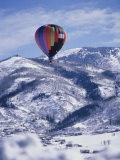 Buy Colorful Hot Air Balloon Against Winter Landscape at AllPosters.com