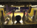Rear View of Pins Being Struck by a Bowling Ball