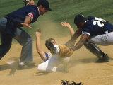 Baseball Player Sliding on a Base
