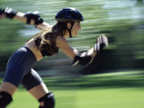 Side Profile of a Young Woman Inline Skating