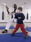 Buy Young Man Teaching a Boy Martial Arts at AllPosters.com