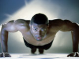 Buy Portrait of a Mid Adult Man Exercising at AllPosters.com