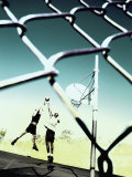 Low Angle View of Two Men Playing Basketball Behind a Chain-Link Fence