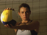 Young Woman Playing Beach Volleyball