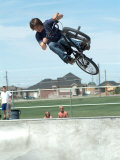 Buy Performing a Bicycle Stunt at AllPosters.com