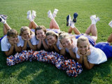 High Angle View of Cheerleaders Lying on a Lawn