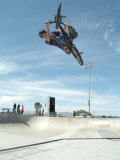 Buy Performing a Bicycle Stunt at AllPosters.com