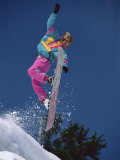 Buy Snowboarder Performing Stunt Maneuver at AllPosters.com