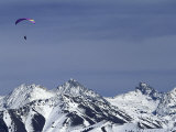 Buy Paraglider Over Snowy Mountains at AllPosters.com