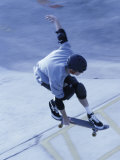 High Angle View of a Young Man Skateboarding