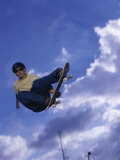 Buy Low Angle View of a Young Man Skateboarding at AllPosters.com
