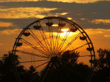 Buy The Ferris Wheel at the Ingham County Fair is Silhouetted against the Setting Sun at AllPosters.com