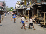 Children Play Soccer on One of the Streets of the Business District of Lagos