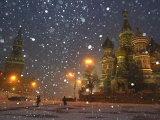 Pedestrians Pass by the Moscow Kremlin