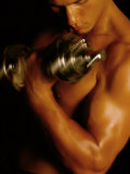 Buy Young Man Exercising with Dumbbells at AllPosters.com