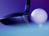 Close-up of a Golf Ball and a Golf Club