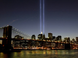 The Tribute of Light Memorial Shines into the Sky Over the Night Skyline of New York City