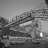 Pedestrians Cross Virginia Street as the Arch That Proclaims Reno: the Biggest Little City
