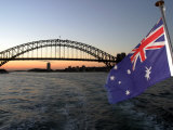 Australian Flag and Sydney Harbor Bridge at Dusk, Australia