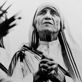 Buy Mother Teresa of Calcutta Prays During a Religious Service at AllPosters.com