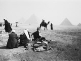 Camel Jockeys at the Giza Pyramids, Cairo, Egypt