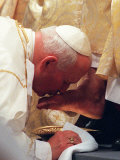 Buy Pope John Paul II Kisses the Foot of a Clergyman at AllPosters.com
