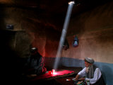 Afghan Men Have Lunch at an Old Tea Shop