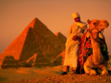 Camel and Driver Resting near the Great Pyramids, Egypt