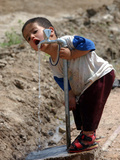 A Young Internally-Displaced Child at a Camp for Displaced Iraqis Who Have Fled Violence